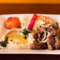 Chicken Shawarma · served with rice,  humos , and pita bread