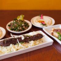Meat Mezza · Tabbouleh, hummus baba ghanouje, meat pies, char-broiled 100% grass-fed ground beef kofta ke...