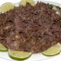 Half Lb. Barbacoa · Half lb. with onion, cilantro, lime and tortillas on the side flour or corn.
