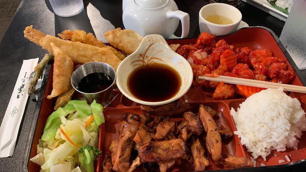 Bento Boxes · Teriyaki chicken, steamed rice, stir fried vegetables, 4 pieces California roll or 4 pieces gyoza.