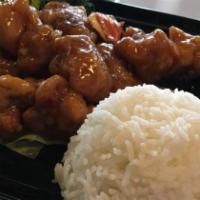 Orange Chicken · Deep fried breaded chicken in homemade orange sauce, it come with onions and peppers. A litt...