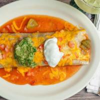 Ixtapa Burrito · House best seller! Flour tortilla filled with meat of your choice with rice and beans, toppe...