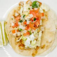 Two Fresh Tillapia Fish Tacos · Served with rice and beans.