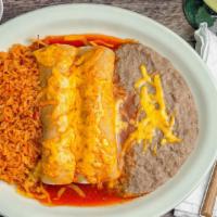 Enchilada Grande · Super enchilada filled with your choice of meat and cover with our house special sauce. Topp...