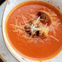 Tomato Soup · tomatoes blended with caramelized onions, touch of cream