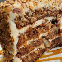 Amaretto Carrot Cake · Amaretto soaked carrot cake, cream cheese frosting, toasted almonds