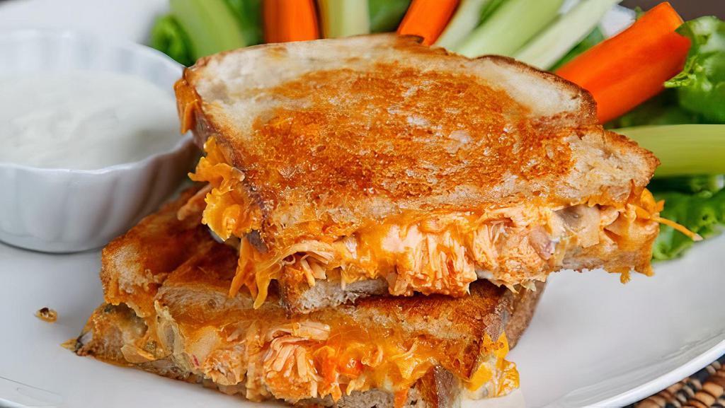 Buffalo Grilled Cheese · Slice turkey breast melted together with buffalo sauce, jack cheese, blue cheese and caramelized onion.