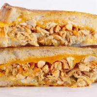 Chipotle Chicken Grilled Cheese · Chicken is melted with Cheddar cheese,  caramelized onion and Chipotle Mayo.