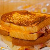 Bacon Grilled Cheese · Baconis melted together with Cheddar Cheese.
