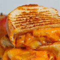 Chipotle Turkey Grilled Cheese · Chicken is melted with Cheddar cheese,  caramelized onion and Chipotle Mayo.