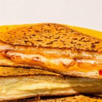 Chipotle Pastrami Grilled Cheese · Pastrami is melted with Cheddar cheese,  caramelized onion and Chipotle Mayo.