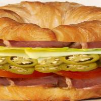Belly Buster Croissant · Double pastrami, swiss cheese, greek pepper, tomato ,lettuce, mayo & mustard.