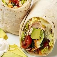 Kettle Chicken Wrap  · Grilled Chicken, Jack Cheese,Avocado, Tomato,Lettuce,Cucomber & Ranch 
Dressing.