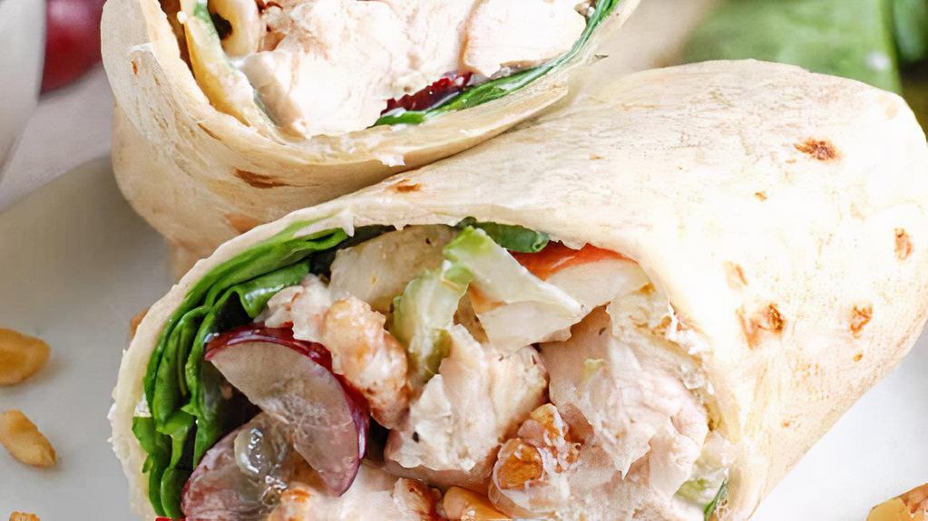 Kettle Chicken Salad Wrap · Chicken Salad , Jack Cheese, Avocado, Tomato,Lettuce,Cucomber & Ranch 
Dressing.