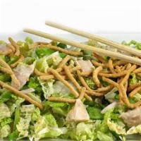 Asian Chicken · Mixed green lettuce, grilled chicken breast, shredded cabbage, with Asian sesame dressing.