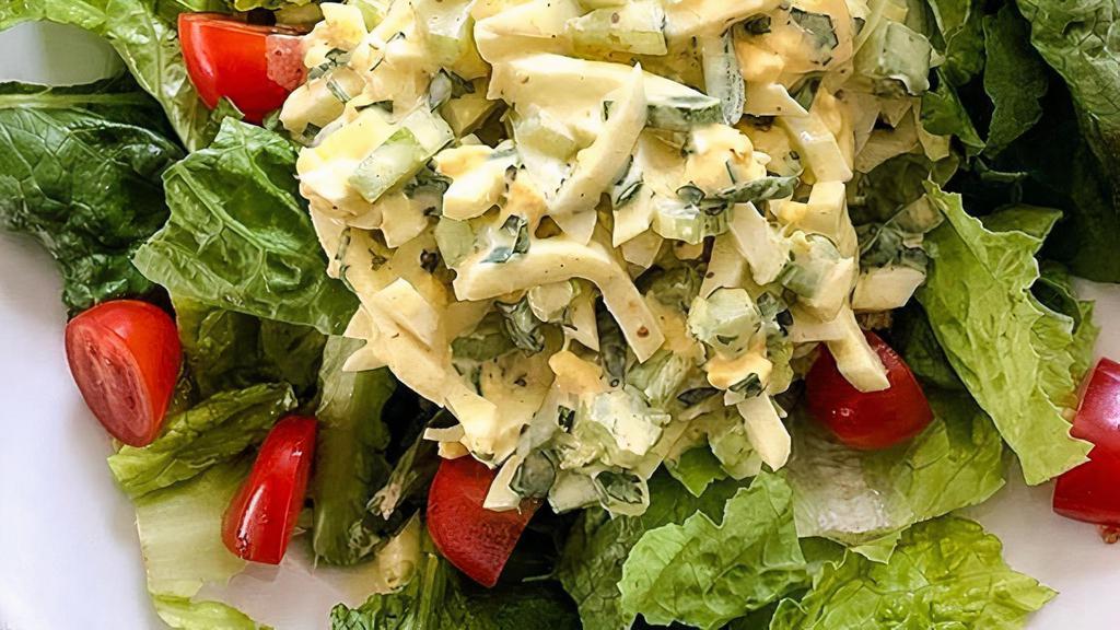Egg Salad Mixed Green · Egg Salad , Mixed green lettuce, Tomato,Jack cheese and Cucumber.  Croutons and balsamic vinaigrette on the side.