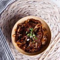 Mongolian Beef · Tender sliced beef stir fried with scallions, onions and a savory ginger, garlic, chili, soy...