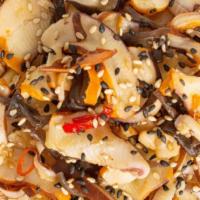 Squid Salad · Tender, thinly sliced squid, scallions, chili peppers and wood ear mushrooms marinated in a ...