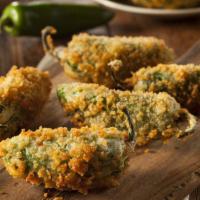 Jalapeño Poppers (4 Pcs) · Spicy jalapeños stuffed with cheese, lightly breaded and fried until crisp and golden on the...