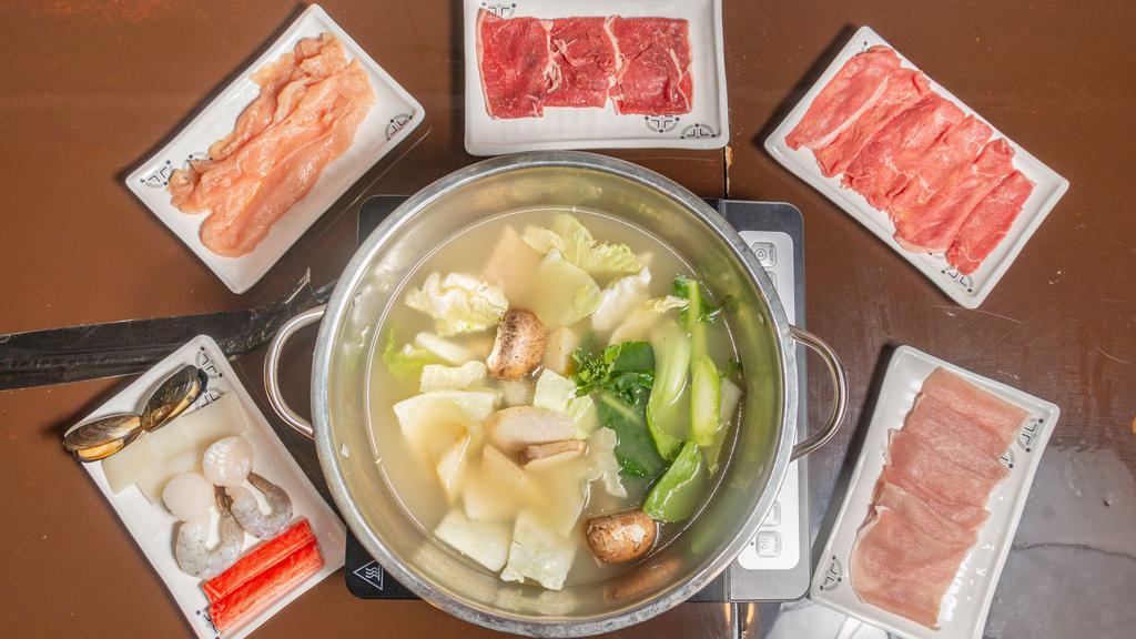 Chinese Herb Soup · Choose options and spice level. All hot pot Togo comes with mixed veggies and rice fully cooked. Ready to eat.