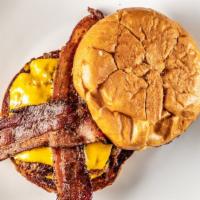 Bacon Smushburger · Two Smushburger patties (beef, bacon Cheddar and onion patty) with two strips of thick-cut b...