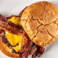 Little Bacon Smushburger · Smushburger patty (beef, bacon Cheddar and onion patty) with two strips of thick-cut bacon a...