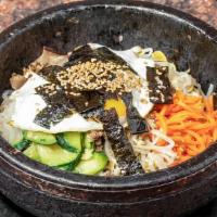 D-18. Bibimbob · Rice, Beef, Egg, and Assorted Vegetable with Hot and Spicy Sauce.