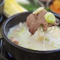 D-17. Seolleong Tang · Beef Bone Broth with Sliced Beef & Noodles.