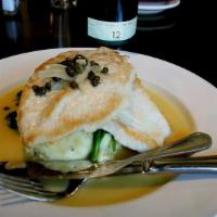 Chicken Piccata · Pan seared chicken breast over our garlic and basil mashed potatoes and wilted spinach with ...