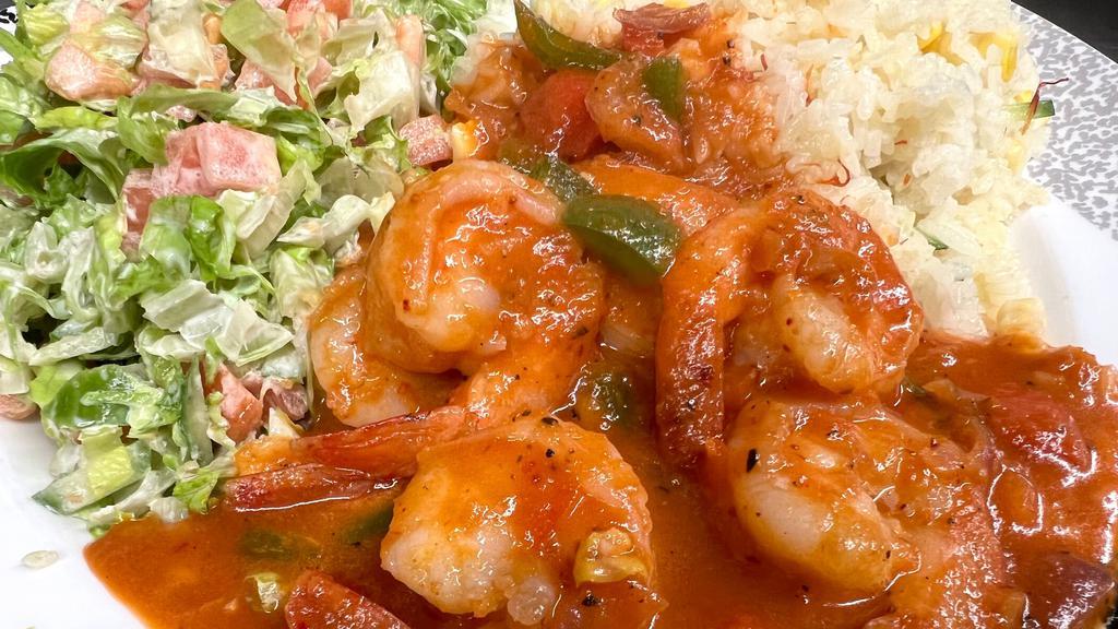Salvadoran Shrimp · Gluten free, spicy. Special. Sautéed bell peppers and onions in a spicy Romanesca sauce, Spanish rice and a slaw.