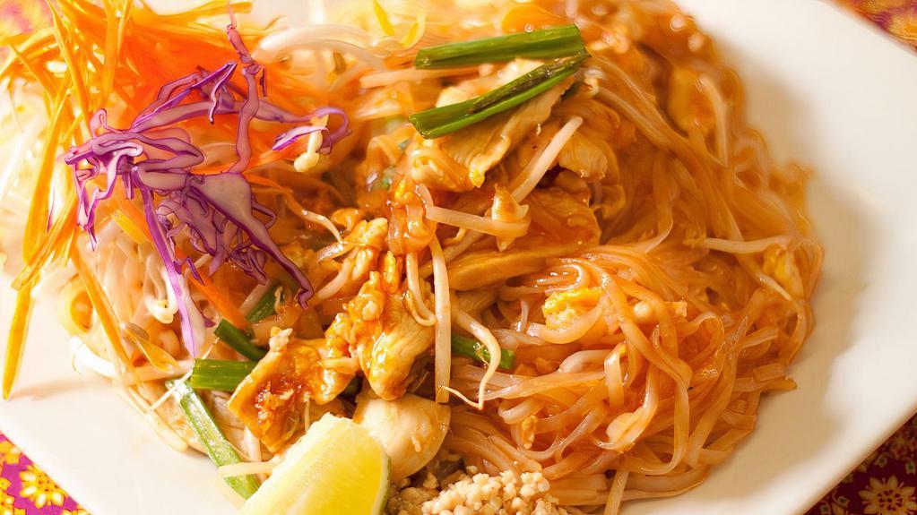 Chicken Pad Thai · Choice of chicken, beef, pork or tofu. Stir-fried rice noodles with meat, special pad thai sauce, eggs, bean sprouts, tofu and green onions, served with crushed peanuts and a fresh lime slice on the side.