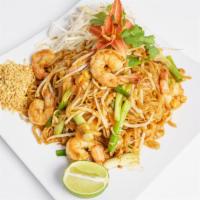 Shrimp Pad Thai · Fried rice noodles with shrimps, special pad thai sauce, eggs, bean sprouts, tofu and green ...