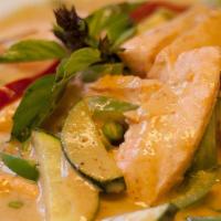 Green Curry · Mild spicy, green curry in coconut milk, with bell peppers, zucchini, bamboo shoots and thai...