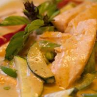 Panang Curry · A rich panang curry in coconut milk with meat, bell peppers, zucchini and thai kaffir lime l...