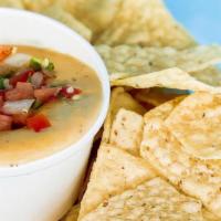 Chips + Queso · White Corn Chips + Spicy Queso Blanco