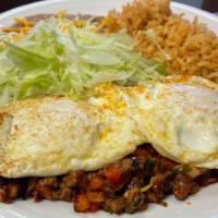 Huevos Rancheros Breakfast · Served with rice and beans.
