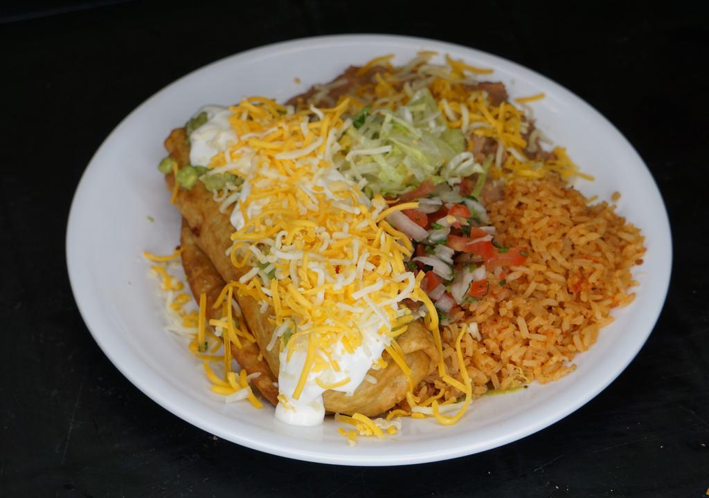 Chimichanga Combo · guacamole, sour cream, cheese. Served with rice and beans.