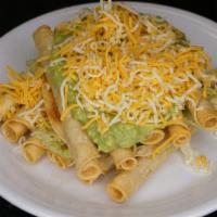 12 Rolled Tacos · With guacamole and cheese.