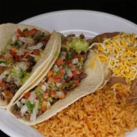 Two Carne Asada Tacos Plate · Served with rice and beans.