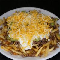 Carne Asada Fries · choice of meat, guacamole, sour cream, and cheese.