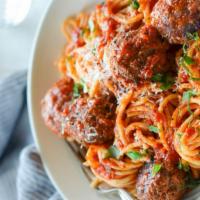 Spaghetti & Meatball Love Story · Al dente spaghetti in our house made garlic marinara sauce paired with meatballs and topped ...