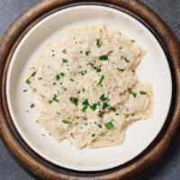 Meaty Ravioli · Ravioli pasta cooked mushroom and cream sauce.