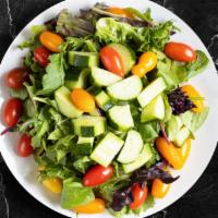 House Salad · Mixed greens and fresh tomatoes drizzled with balsamic dressing.
