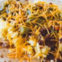 Breakfast Burritos · Bacon or Chorizo, Eggs, Potatoes, Cheese, and your choice of chile