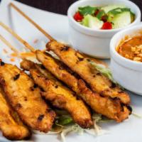 Chicken Satay · 5 pieces. Marinated chicken skewers, served with peanut sauce