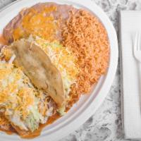 Beef Taco & Enchilada · Served with rice and beans.