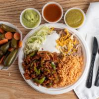 Chicken Fajitas · Grilled chicken  with bell pepper and onion served with lettuce and sour cream