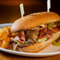 Zeppelin Turkey Jack · Hot turkey, Swiss cheese, spicy pickled peppers, grilled onion and mushrooms, lettuce, tomat...