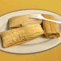 Tamal  · Three options of this traditional corn masa dough with a filling that can be either chicken,...