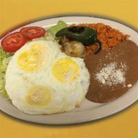 Huevos Rancheros · Served with rice, beans, salad, guacamole, grilled jalapeno peppers, grilled onions. Choice ...